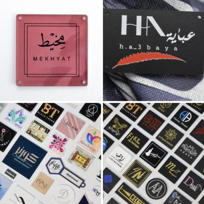 شعارات أكريليك مخصصة للملابس في الكويت - Kuwait Region Custom Boxes, Packaging, & Printing