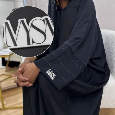 شعارات أكريليك مخصصة للملابس في الكويت - Kuwait Region Custom Boxes, Packaging, & Printing